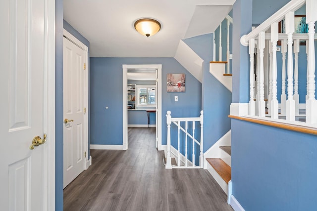 hall featuring dark wood-type flooring