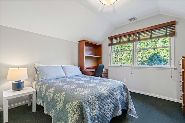 carpeted bedroom with lofted ceiling, visible vents, and baseboards