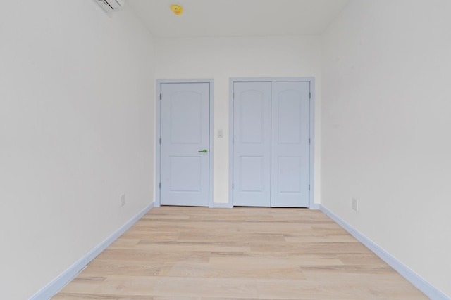 unfurnished bedroom with light hardwood / wood-style floors