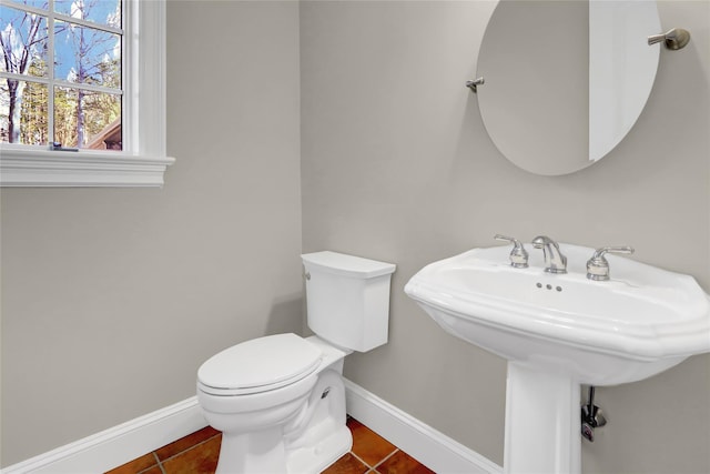 bathroom featuring tile patterned flooring and toilet