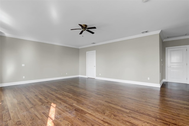 empty room featuring crown molding, ceiling fan, and dark hardwood / wood-style floors