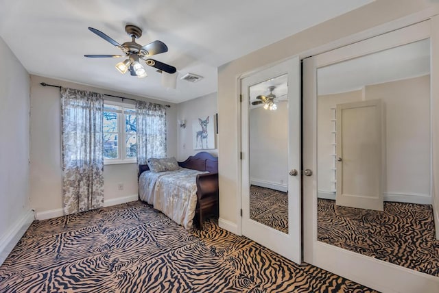 bedroom featuring french doors and ceiling fan