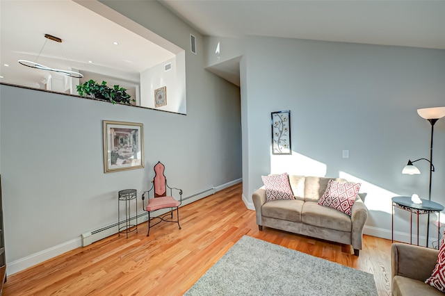 living room with lofted ceiling and wood-type flooring