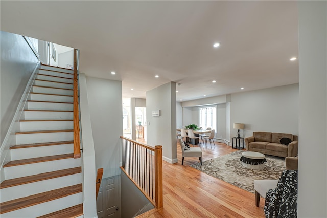 2726 Clarendon Ave, Bellmore, NY 11710 - stairway with recessed lighting and wood finished floors
