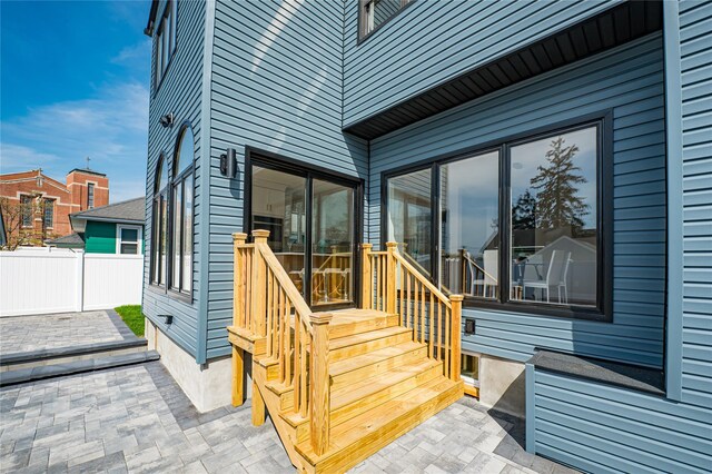 2726 Clarendon Ave, Bellmore, NY 11710 - doorway to property featuring a patio area