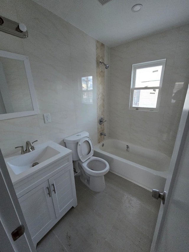 531 Bch 72nd St, Arverne, NY 11692 - full bath featuring tile walls, vanity, and  shower combination
