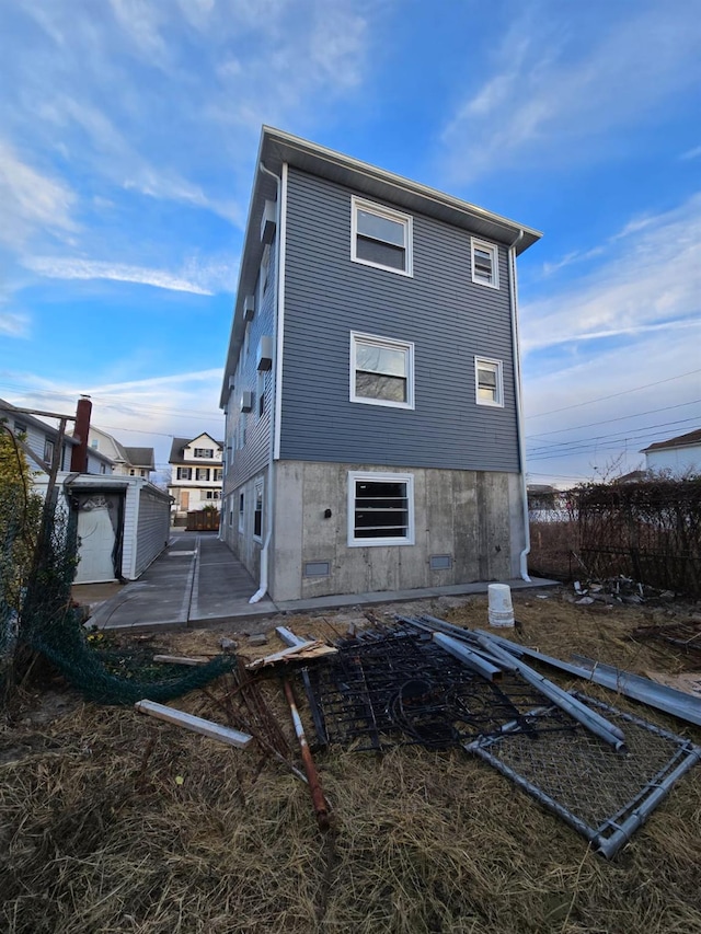 back of house featuring a patio