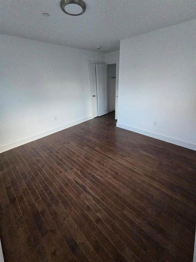 531 Bch 72nd St, Arverne, NY 11692 - spare room featuring dark wood-style flooring
