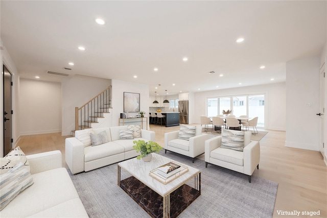 living room featuring light hardwood / wood-style flooring