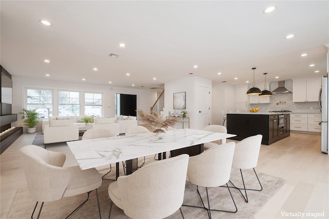 dining room featuring light hardwood / wood-style floors