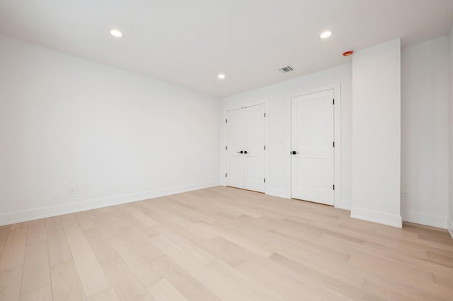 unfurnished bedroom featuring light hardwood / wood-style floors