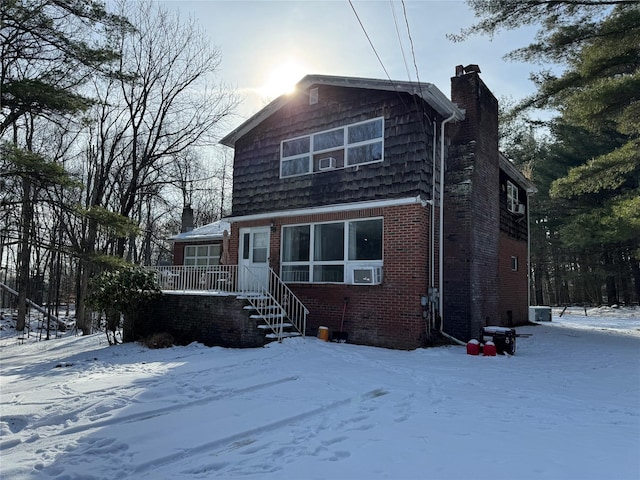 view of front of home with cooling unit