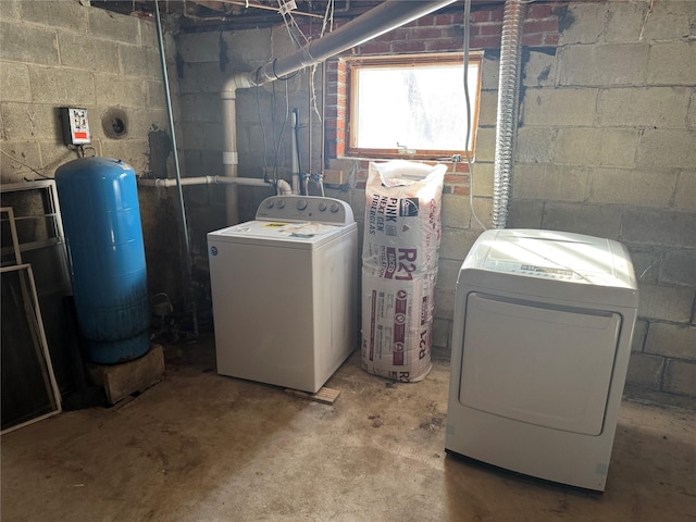 laundry area with separate washer and dryer