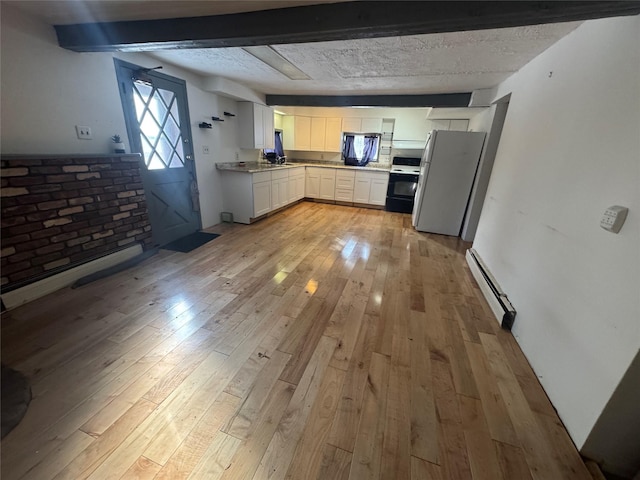 kitchen with white appliances, light wood-type flooring, baseboard heating, beam ceiling, and white cabinetry