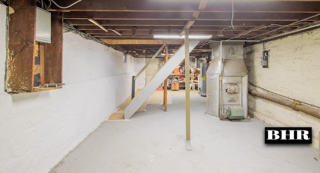 basement featuring water heater