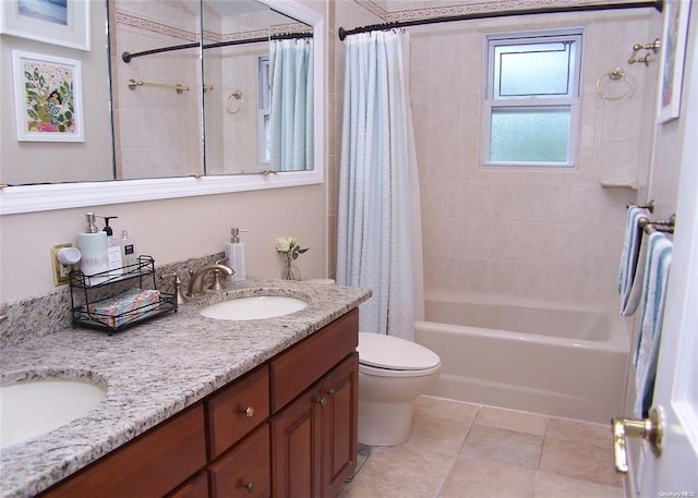 full bathroom with tile patterned flooring, shower / bath combo, vanity, and toilet