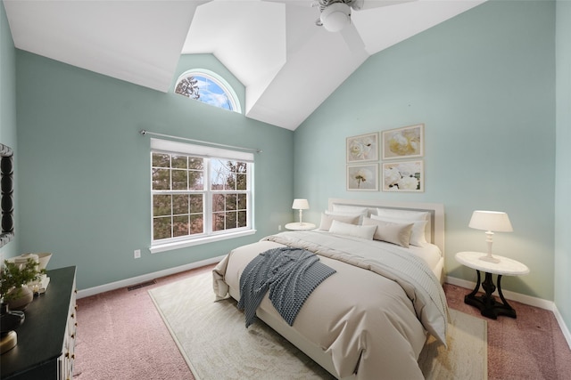 carpeted bedroom featuring ceiling fan and vaulted ceiling