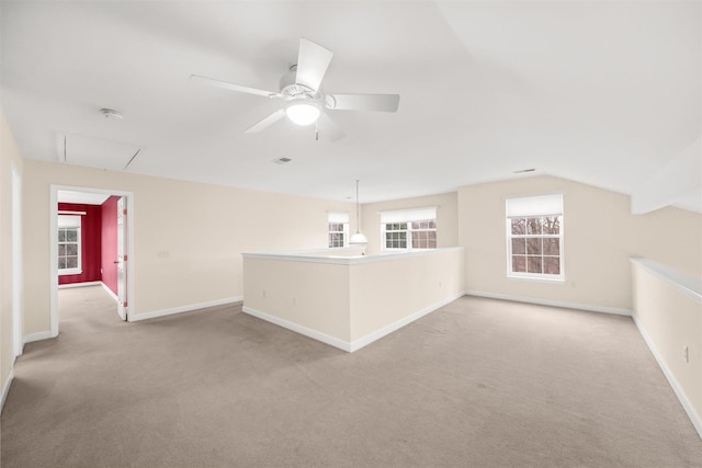 interior space with vaulted ceiling and ceiling fan