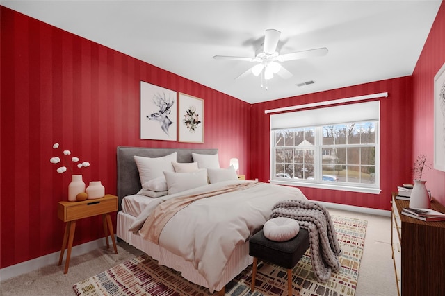 carpeted bedroom featuring ceiling fan