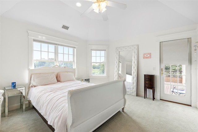 bedroom with access to exterior, ceiling fan, light carpet, and multiple windows