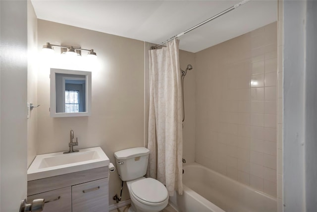 full bathroom with vanity, shower / bath combination with curtain, and toilet