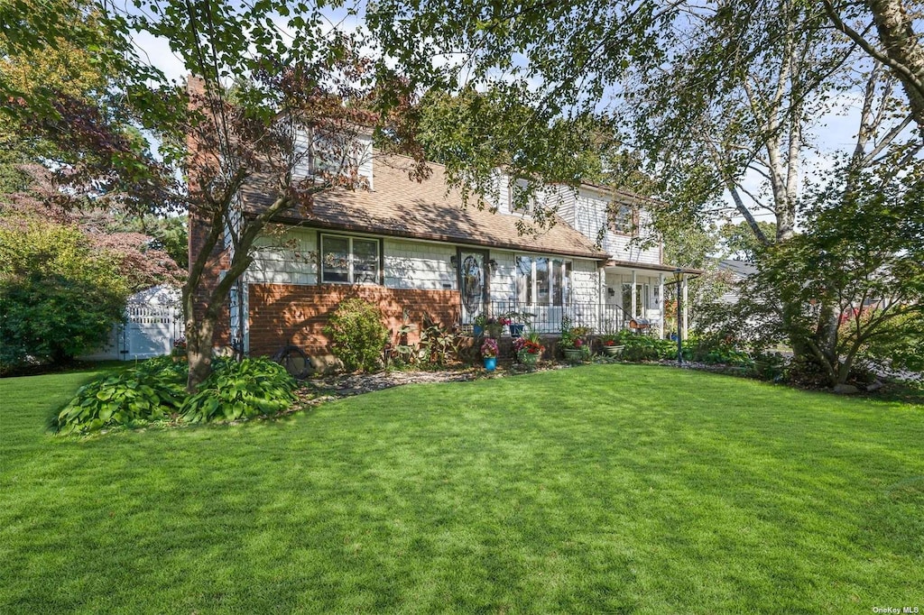 exterior space featuring a front lawn