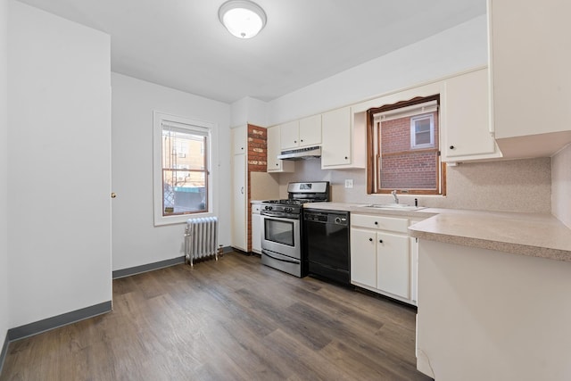 kitchen with radiator heating unit, dishwasher, white cabinets, dark hardwood / wood-style flooring, and stainless steel gas range oven