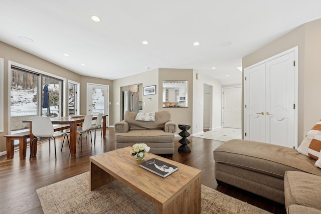 living area featuring dark wood-style floors, recessed lighting, and baseboards