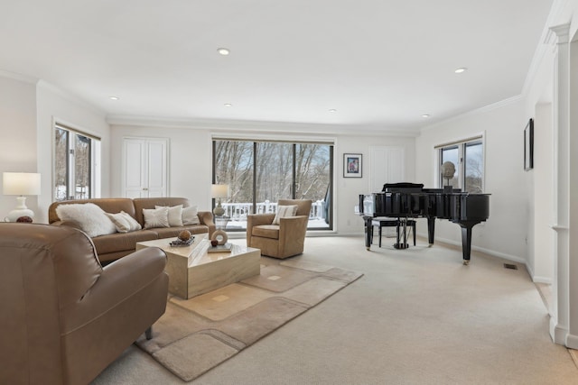 living room featuring recessed lighting, light carpet, crown molding, and baseboards