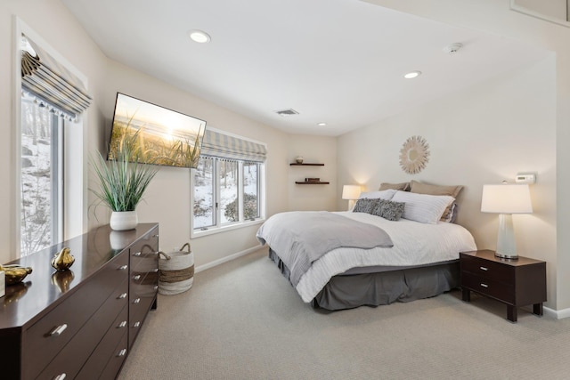 carpeted bedroom with baseboards, visible vents, and recessed lighting