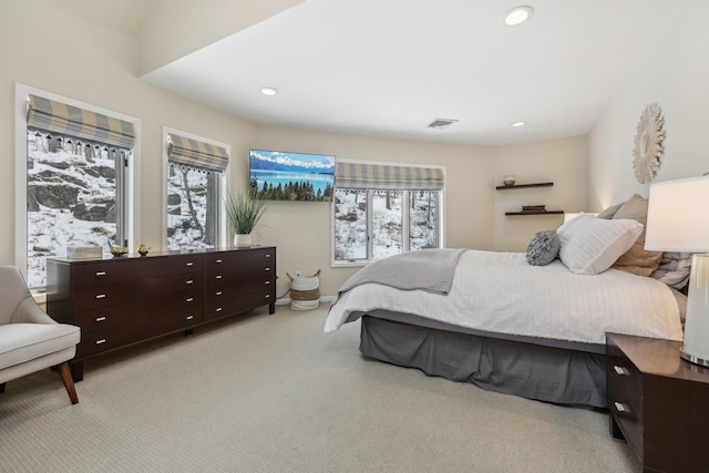 bedroom with recessed lighting, visible vents, and light carpet