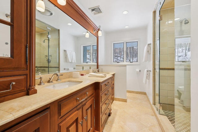 full bathroom with recessed lighting, vanity, visible vents, baseboards, and a shower stall