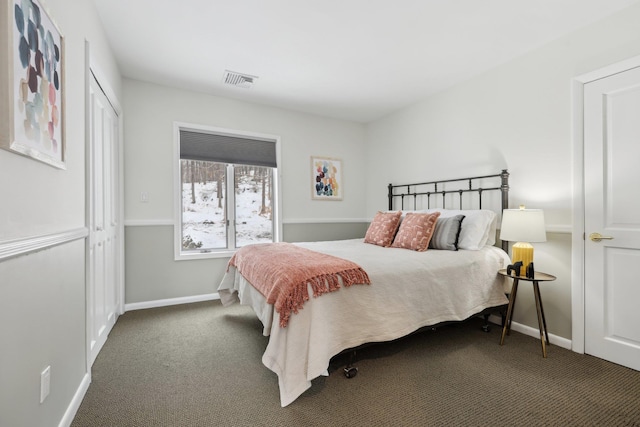 bedroom featuring carpet floors, baseboards, and visible vents