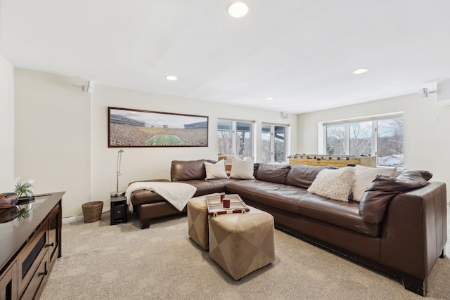 living room featuring recessed lighting and light colored carpet