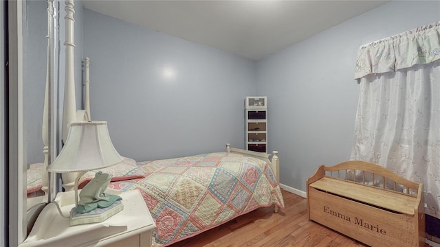 bedroom featuring wood-type flooring