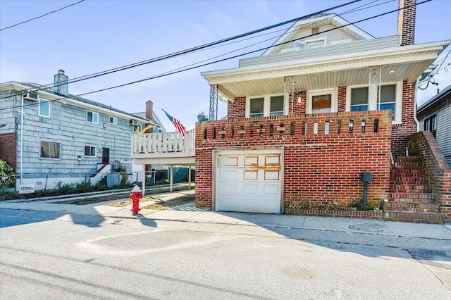 front facade with a garage