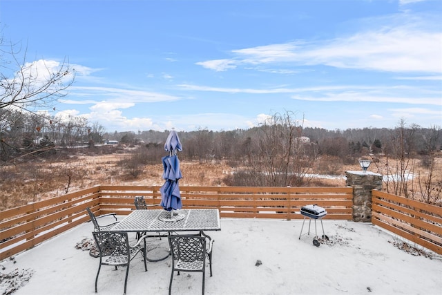 view of snow covered patio