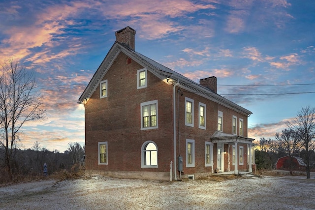 view of property exterior at dusk