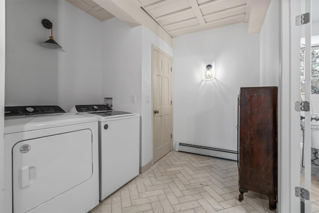 laundry area featuring washer and dryer and baseboard heating