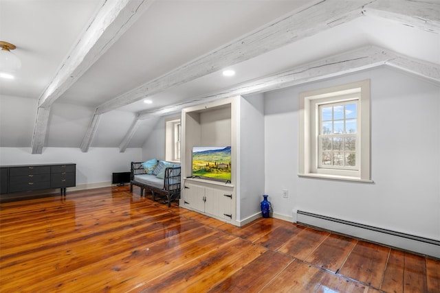 additional living space with baseboard heating, dark hardwood / wood-style flooring, and lofted ceiling