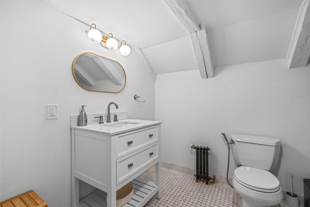 bathroom featuring toilet, vanity, radiator, and vaulted ceiling