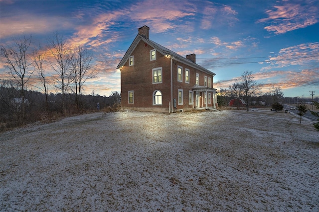 view of property exterior at dusk