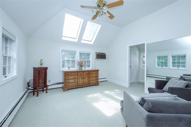 living area featuring carpet, lofted ceiling with skylight, ceiling fan, a baseboard radiator, and an AC wall unit