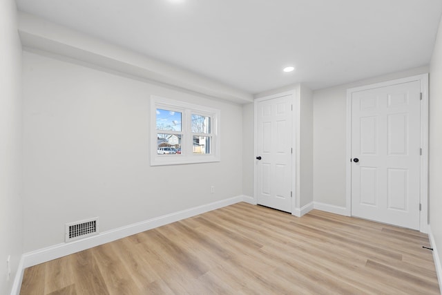 unfurnished bedroom featuring light hardwood / wood-style flooring