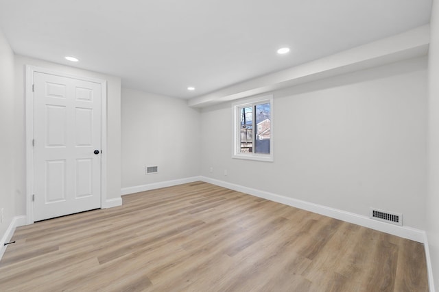 basement with light wood-type flooring