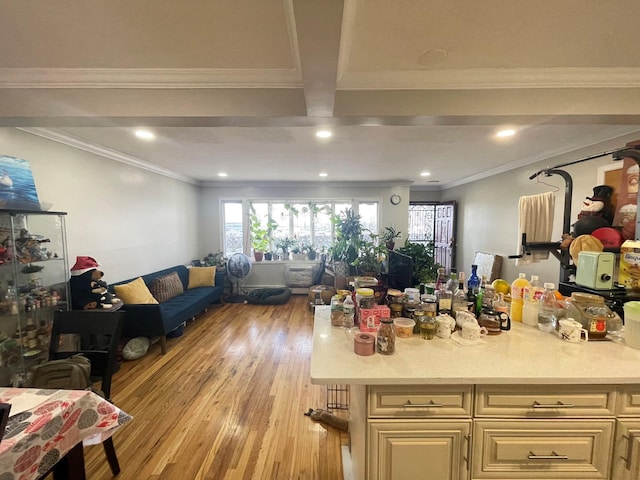 kitchen featuring beamed ceiling, light hardwood / wood-style flooring, ornamental molding, and light stone counters