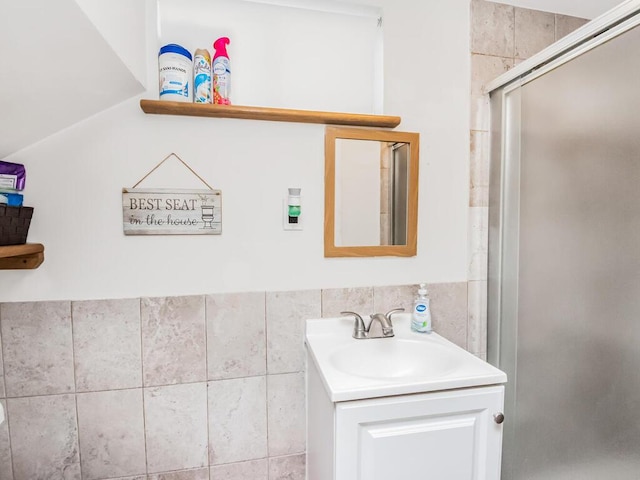 bathroom featuring vanity and walk in shower