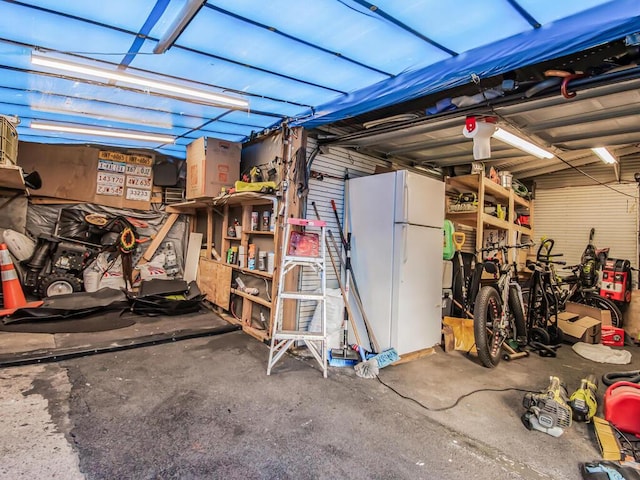 garage featuring white refrigerator