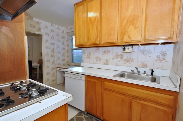 kitchen featuring sink, white appliances, decorative backsplash, and light tile patterned floors