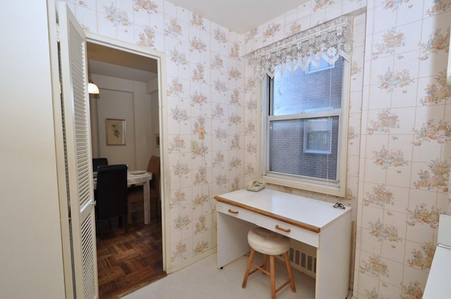 bathroom featuring parquet floors